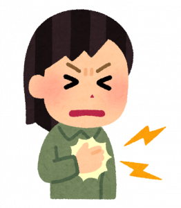胸が痛い女性